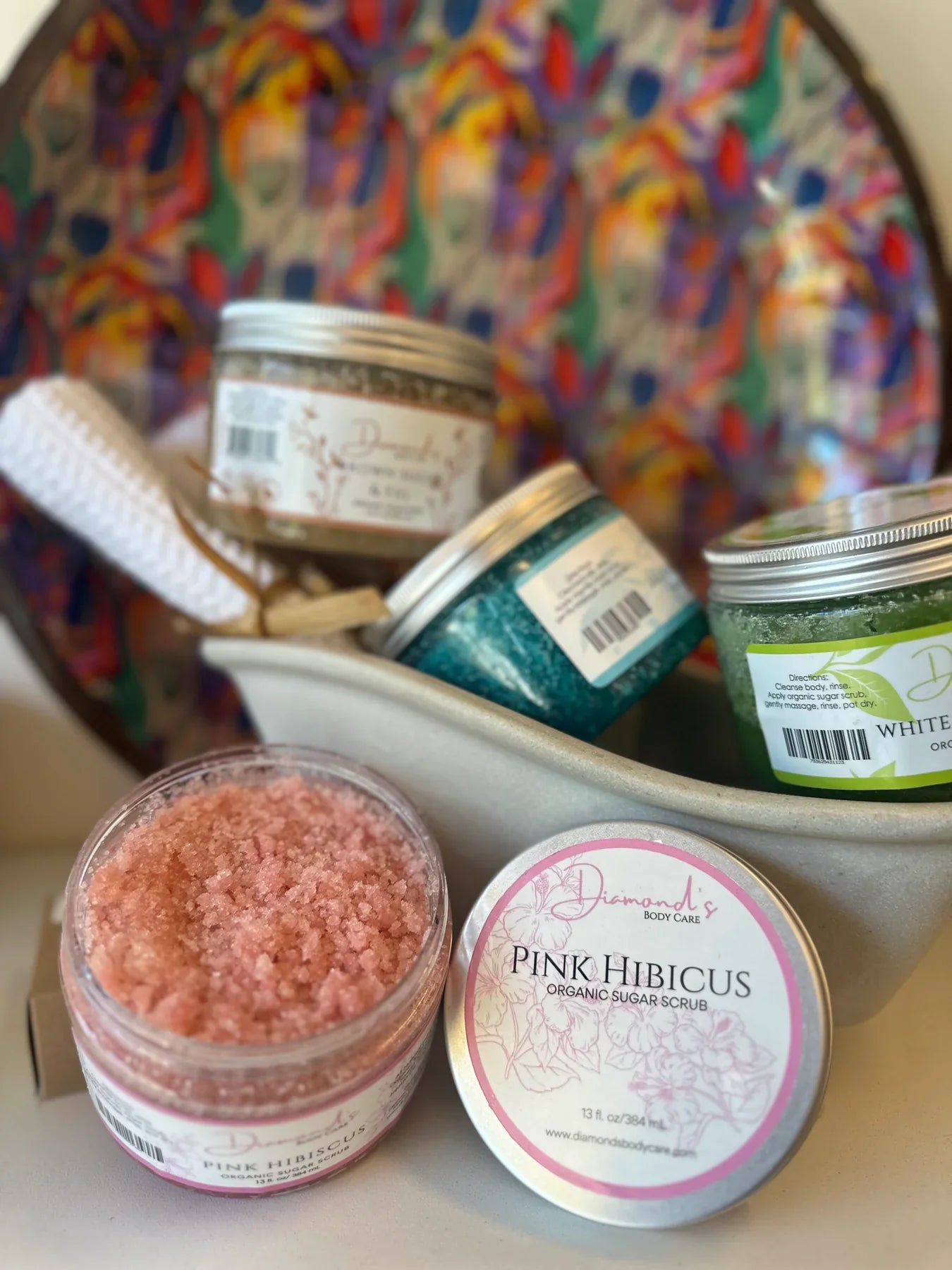 Bucket of Multi-colored Body Scrubs